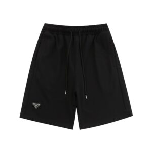 MONOGRAM BADGE SHORTS
